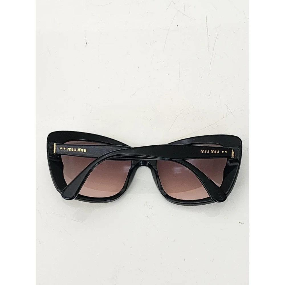 Miu Miu Flawed SMU 03O‎ Black Butterfly Sunglasses Gradient Brown Lens